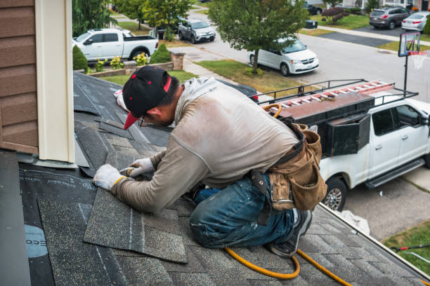 Professional Roofing technician working in Saratoga Springs, NY